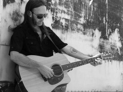 I make my livin' writin' songs, and singin' them Merle Haggard