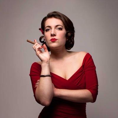Ophelia Derrière is a burlesque dancer and comedienne, known for her quick wit and prominent ASSet, Delilah. She's also a doctor (an actual doctor).