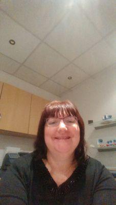 Optometrist treating red and sore eyes. Testing sight and prescribing Glasses and Contact Lenses