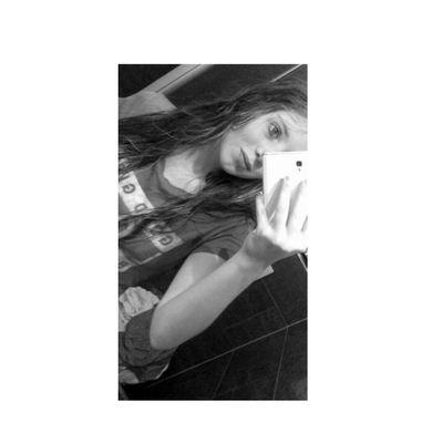 last seen in a little black dress, watch out for those eyes cuz she's armed and dangerous.