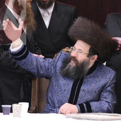 I'm what you call, the man with the black hat. I stuck a feather in my hat & call it Shushan Purim