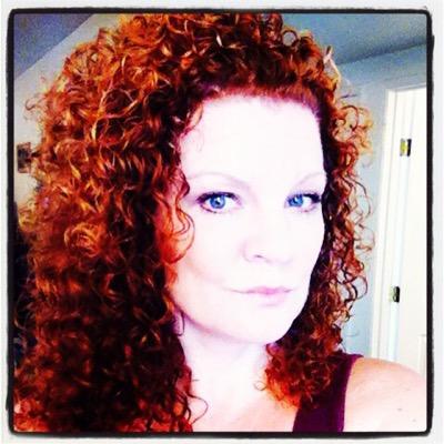 crazy red curly hair & a smile