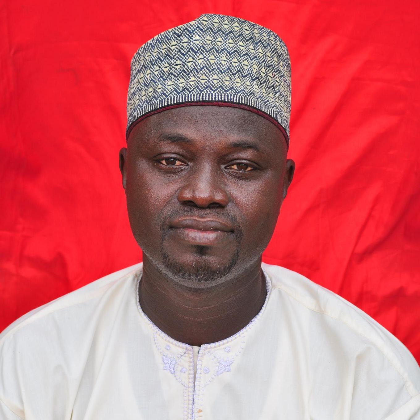 Born in Sokoto; holds B.A., M.A., Ph.D English Language, ND, HD mass comm., Pgd Educ.
