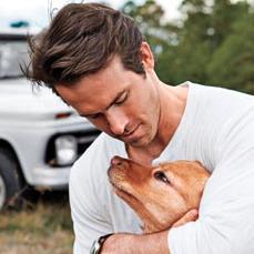 hot guys. cute puppies. you're welcome.