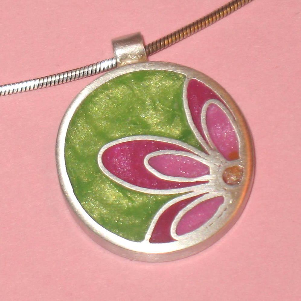 jewelry maker but generally crafty- fond of  mixed media especially polymer clay & paper