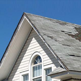 Kansas City roofing contractor performing tile roof replacement in Kansas City Missouri.  Specializing in residential roof replacement from hail damage.