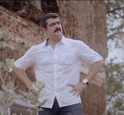 a guy who snaps  everyone  wit a cute pose  !!   :P