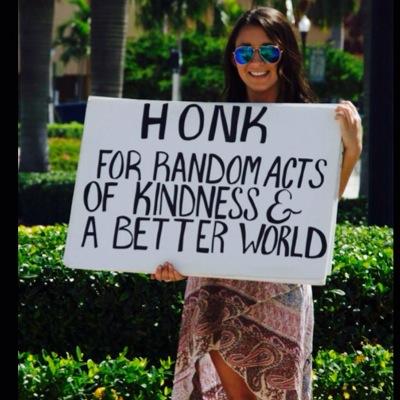 One girl with a poster and a dream to bring compassion to this world, one red light at a time ✌️
