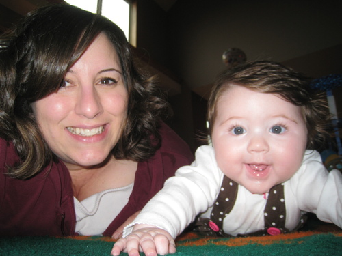 Mommy, wife, singer, artist... pretty good at being all of them.