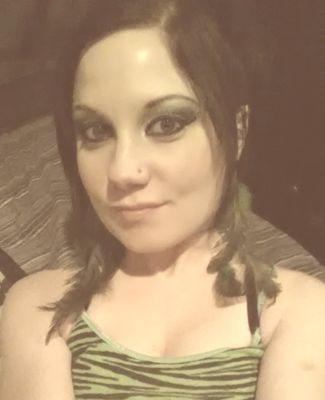 Ukulele Superstar.  Cat enthusiast.  Green hair.  Nuff said.
