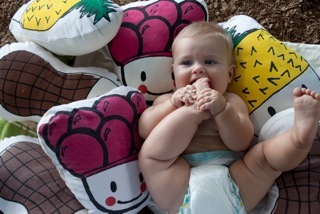 Creating hand made organic baby products with our  wholesome and organic cuddly people design