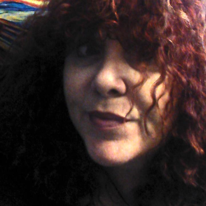 artist, designer, photographer, owner of RedWolf, Inc.