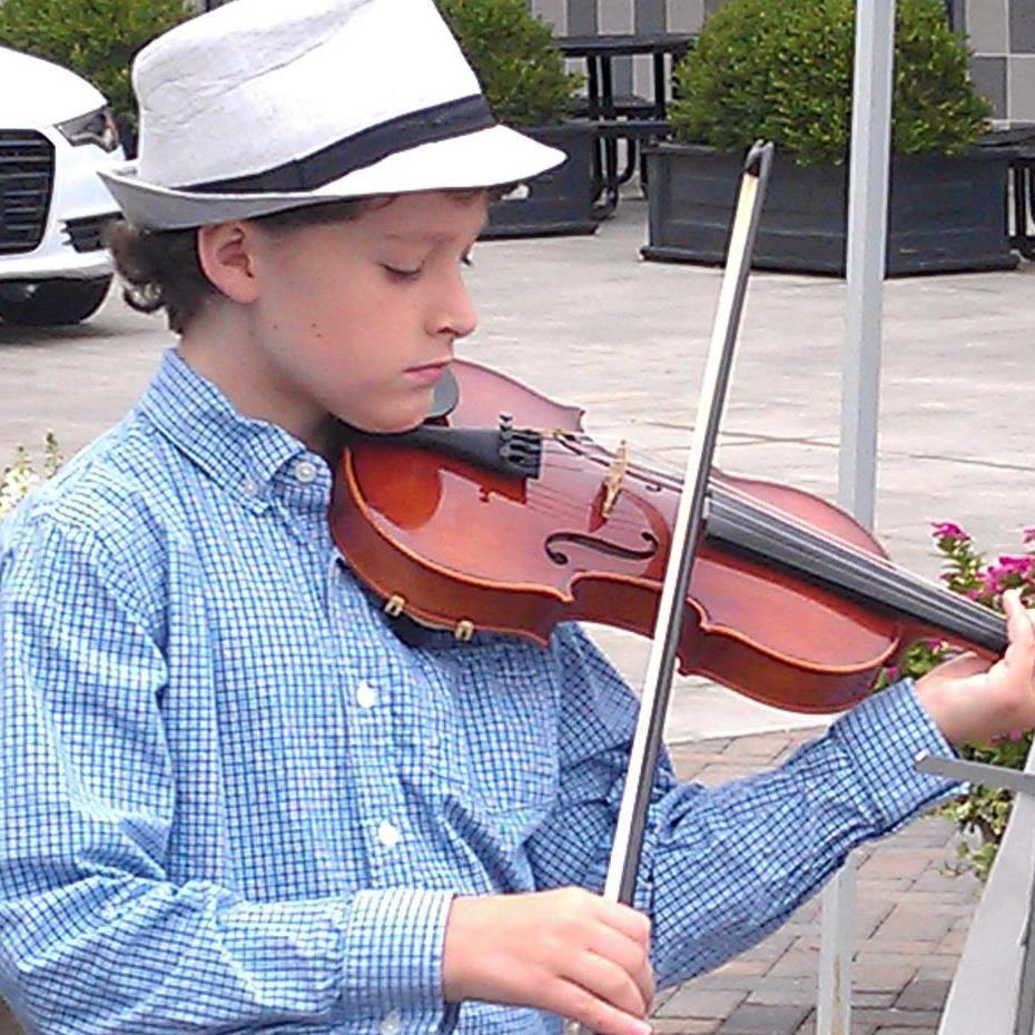 I have been playing the violin for 7 years.  I play at farmers markets in Raleigh, sometimes at the Black Cat Cafe, and at special events in the city.