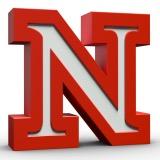 educator, husband, father, Husker, golfer, avid lounger