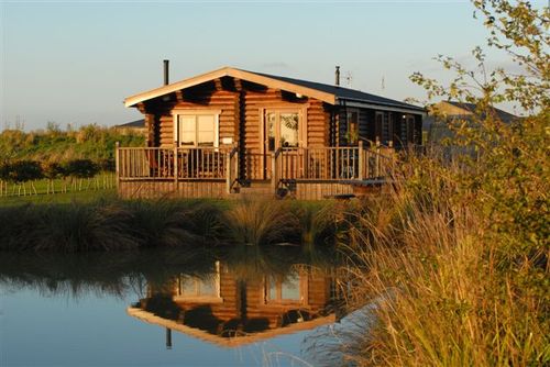 4* & 5* self catering authentic log cabins each with their own private hot tub on a small family run site near Framlingham in Suffolk.