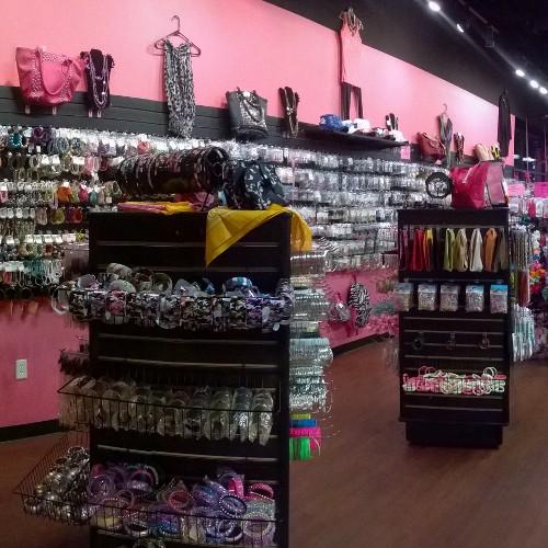 Walls and walls of the cutest jewelry for only $1!  We also sell boutique style jewelry, purses, sunglasses, totes, clothes,hats, and lots more!