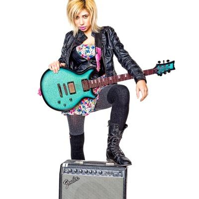 Proffesional Guitarist/vocalist- Daisy Rock Guitar Artist- model- IMDB credited actress. Im totally tubular dude, now let's shred!!! ;)