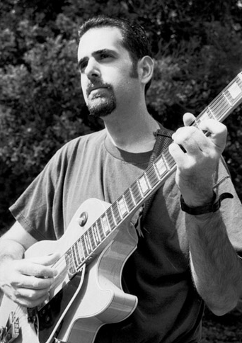 I am a jazz guitarist and vegan  animal protection activist.
