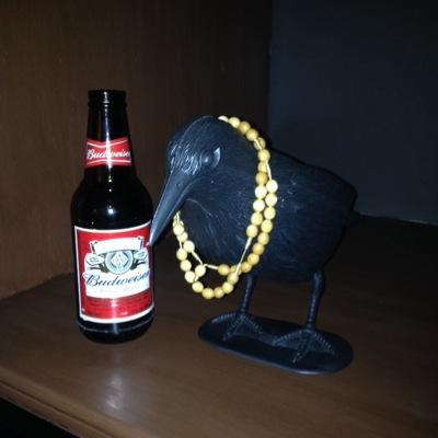 the crow who won't eat your garbage, but will drink your beer.