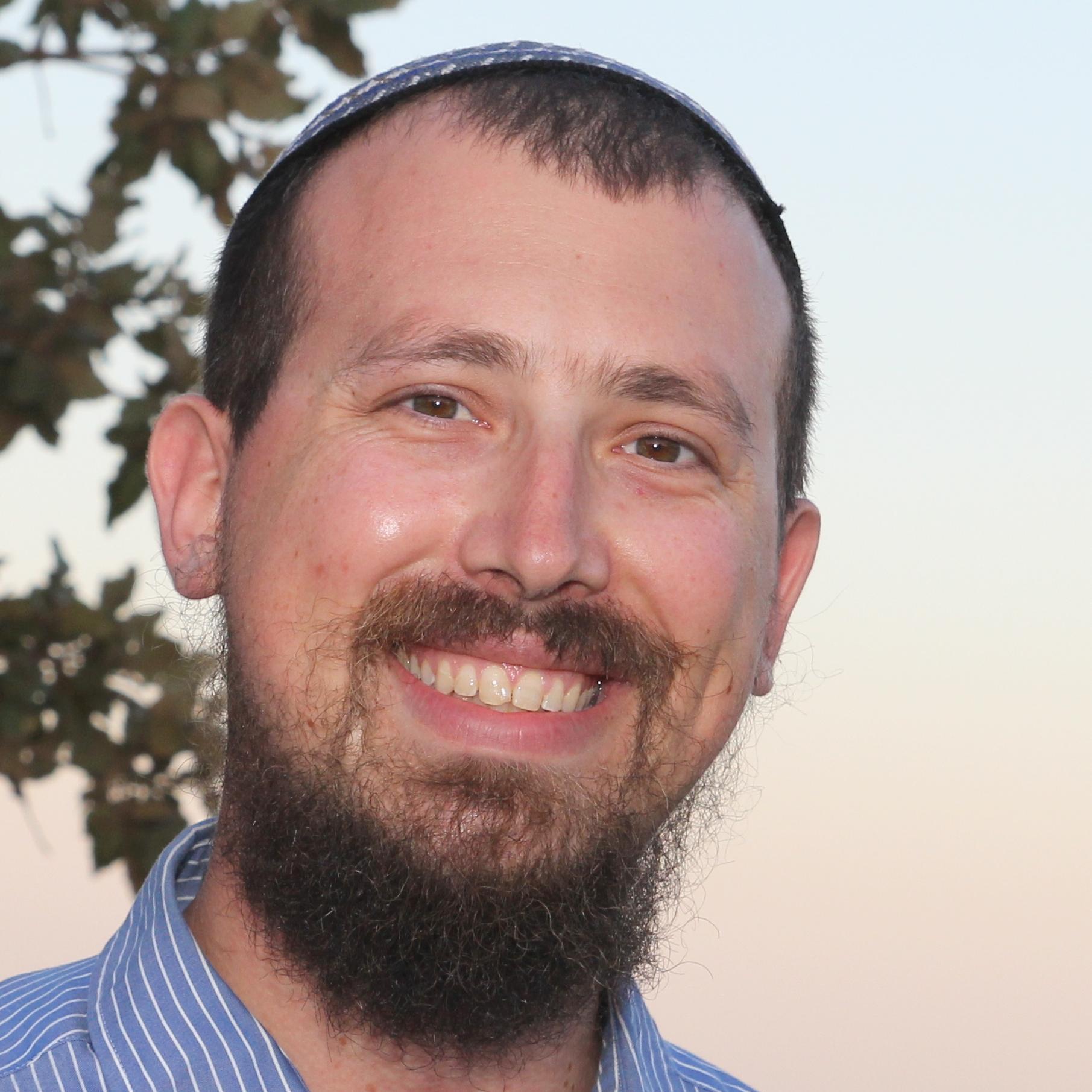 Father, husband, rabbi, once and future tour guide.