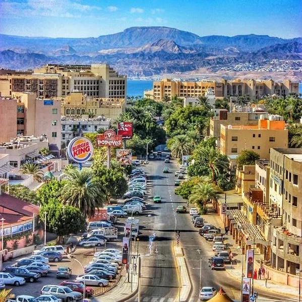 Aqaba is a fusion of history, nature, and city life surrounded by picturesque mountains and blue sea, warm sun, coral reefs of the Red Sea.