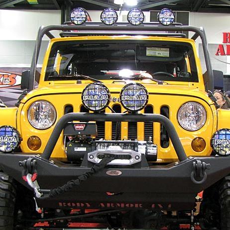 Body Armor makes Jeep, Ford, Toyota, Chevy, Dodge bumpers, rock rails, racks & more. But only for urban or extreme off-roaders seriously into iron. And fun!