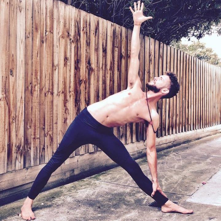 Yoga teacher and student