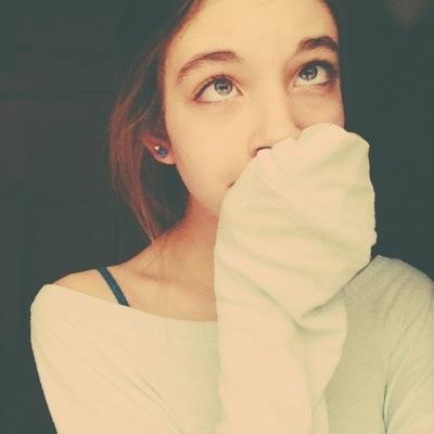 just an awkward teenage girl who is obsessed with youtubers and bands.