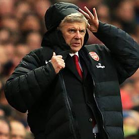 *Parody* Showing funny pictures and struggles that Wenger has with his coat