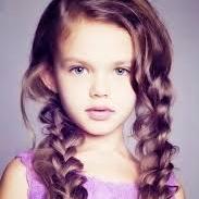 I'm the 9 year old daughter of Ariel. my dream is to someday be allowed to swim. Now in storybrooke with my mommy
