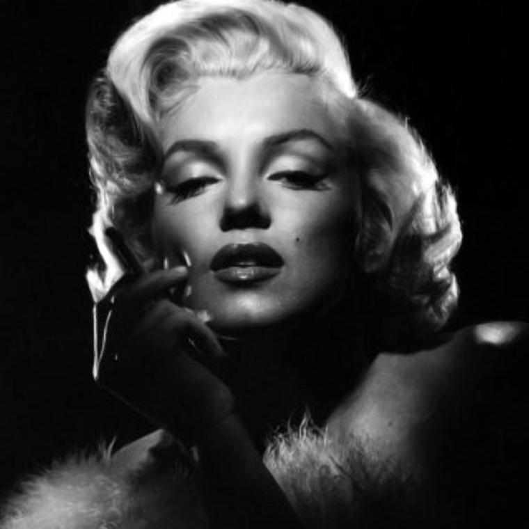 I don't mind living in a man's world as long as I can be a woman in it.