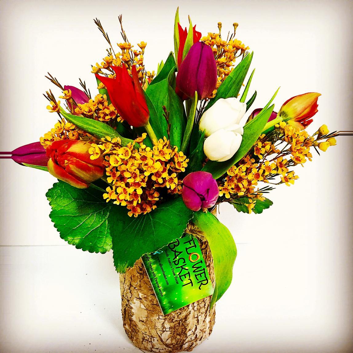Proud new owners of this fun flower shop. We sell and deliver flowers, wine, wine baskets, beer buckets, liquor bouquets, baby baskets, chocolates and balloons!