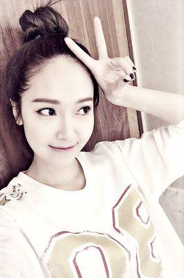 a sweet and lovely real-life barbie with an obsession for foreheads.