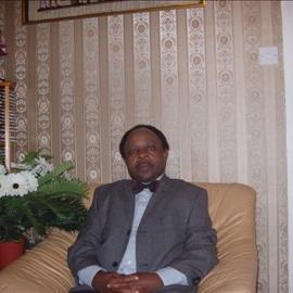 Dr Michael U-A Eshiett: BM. BCh. FRCP. DCN. MSc. MCMI. LLB (Hons). FEBR&PM.