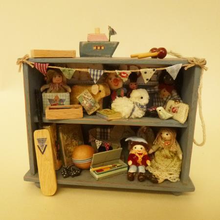 Hand made 12th scale dolls house furniture and accessories please have a look at my website listed below.