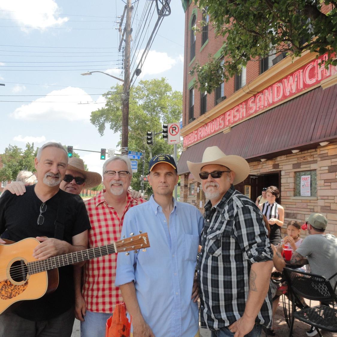 Roots singer-songwriter, writer and leader of honky-tonk band, The Mavens and bluegrass band, The Roustabouts.