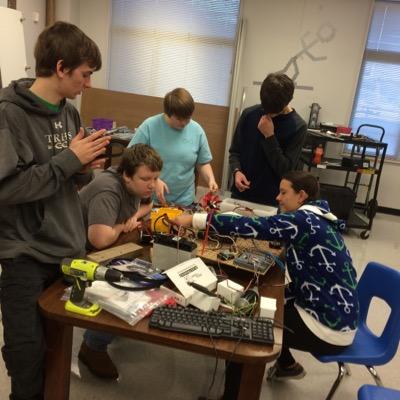 Our hobbies include; Eating, sleeping, and occasionally blowing up robots.