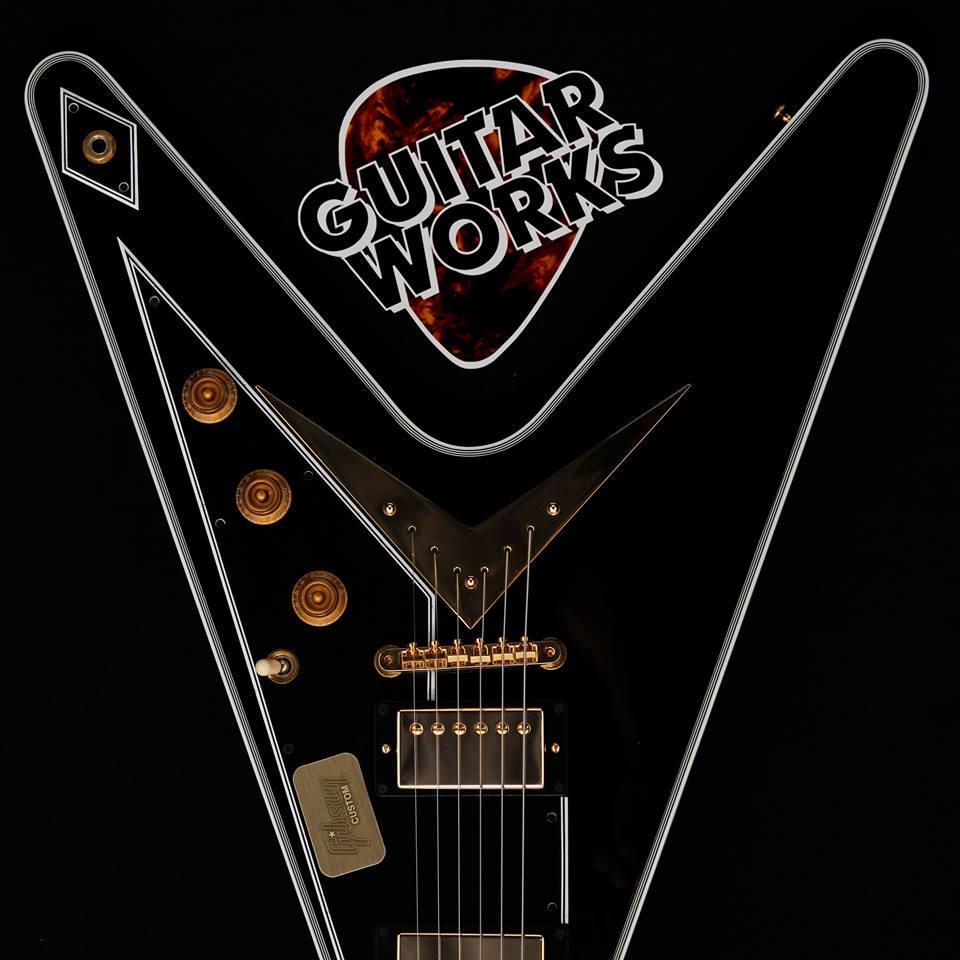 We just really really really really like nice guitars. And we live in Calgary. We aren't afraid of bears. Someone here has a nut allergy. http://t.co/dnb7xShik8