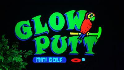 Glow Putt Mini Golf is an indoor, glow-in-the-dark, miniature golf course. The jungle-safari theme surrounds a challenging 18-hole course