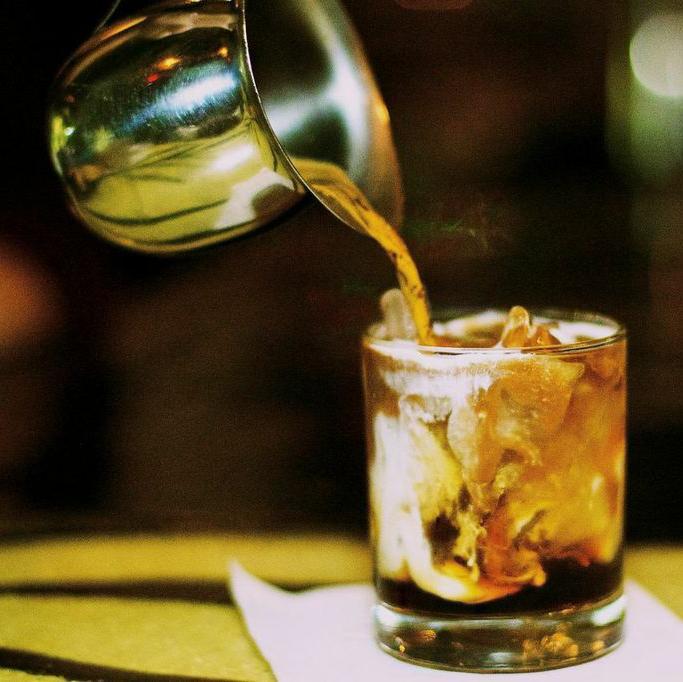 Breezy patio, friendly service, amazing coffee, cool cocktails, fresh juices & over 40 cold beers! Come hide away with us on Main St!