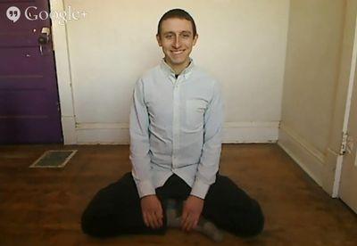 Parody of the happiest man alive who sits down and smiles