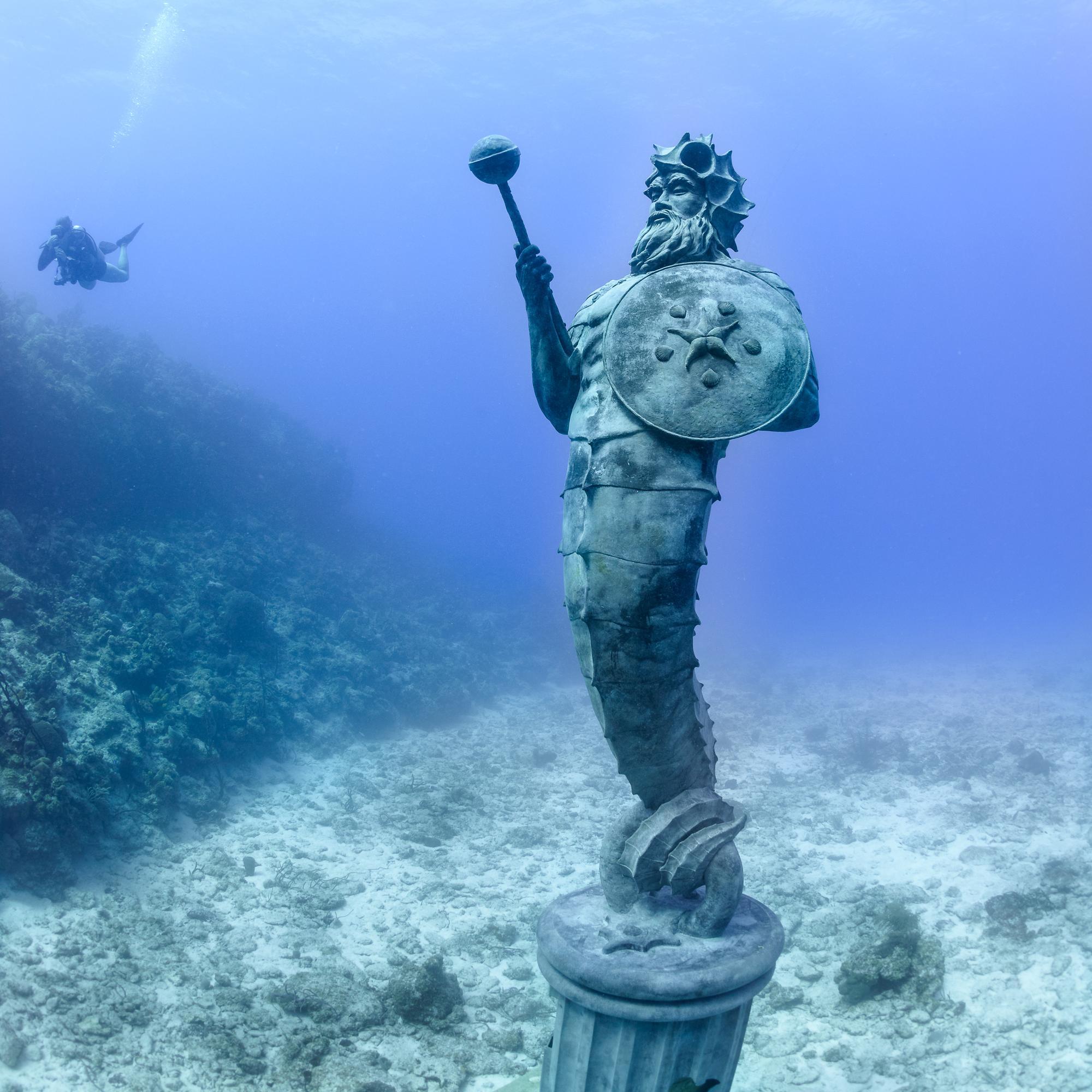 Guardian is the latest larger than life under water bronze sculpture for scuba divers by Simon Morris, known for his 9' bronze mermaids in Grand Cayman and BC