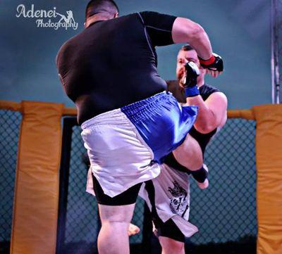 Chris The Hitman Hatfield - American Kenpo, Muay Thai, Jiu Jitsu, Kick Boxing and Catch Wrestling. Standing 6'-1 weighing in at 340 lbs.