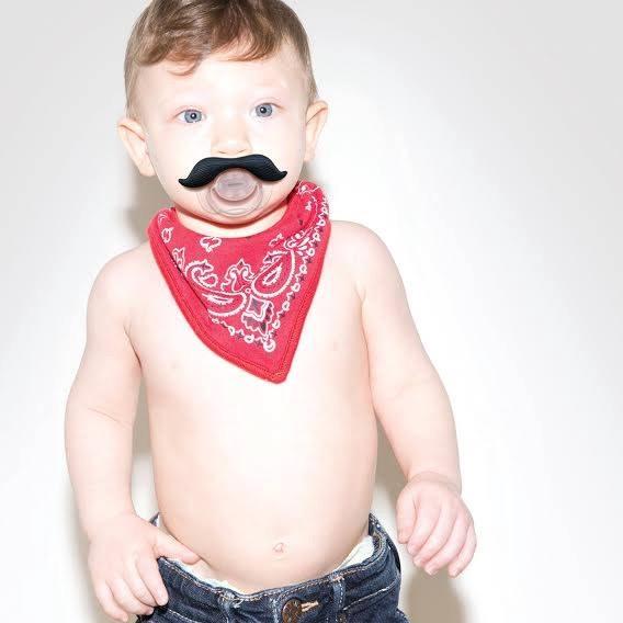 Too young to shave. Old enough for a mustache.