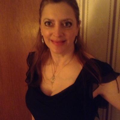 strongwoman strongmaster, reiki master, singer, spiritual healer, comic