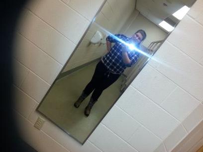 just a country girl from Kansas who loves to sing and act