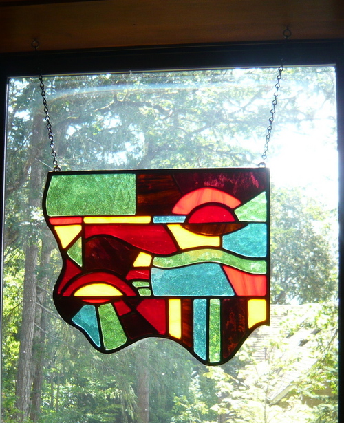 I create stained glass panels because I love the interplay of design, shape, texture and the movement of light. Different angles, time of the day and seasons