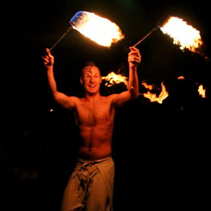 Fire performer, object manipulation instructor, LMT, and wild forest dweller.