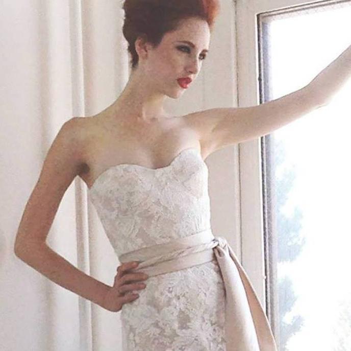 AriaDress's profile picture. Made in USA line of bridal gowns plus accessories.