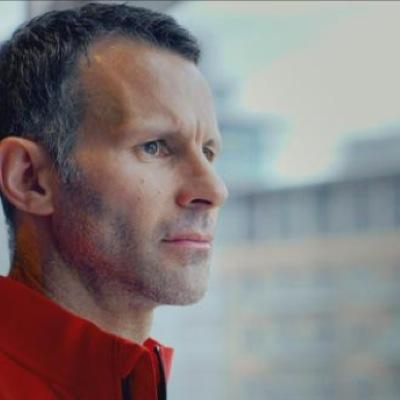 assistant manager at Manchester United and co-owner of Salford City.